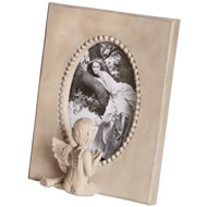  Cherub  Looking  At  Photo