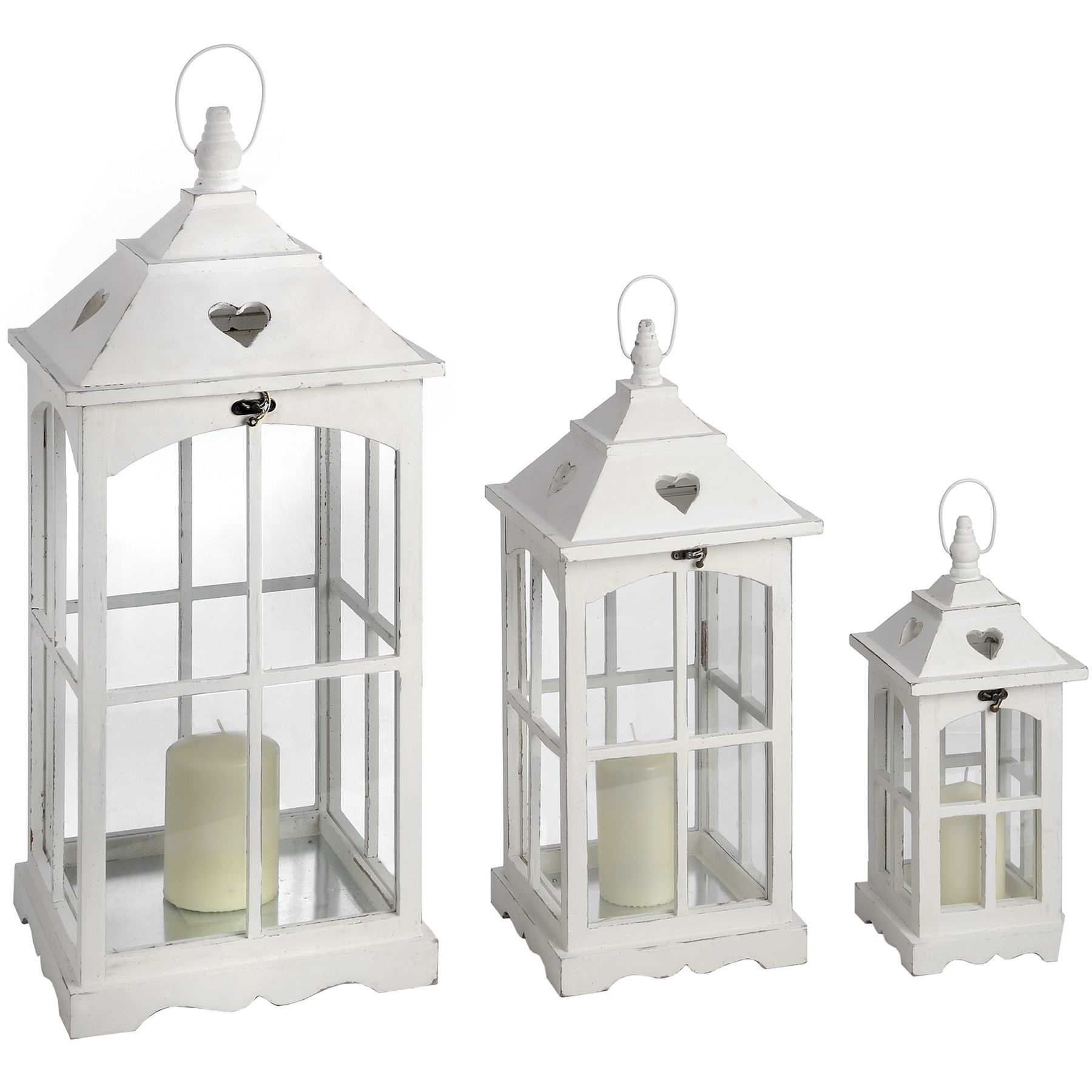 Set of three lanterns with heart cutout. From Hill Interiors