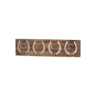 Four Nickel Horse Shoe Hooks On Wooden Board